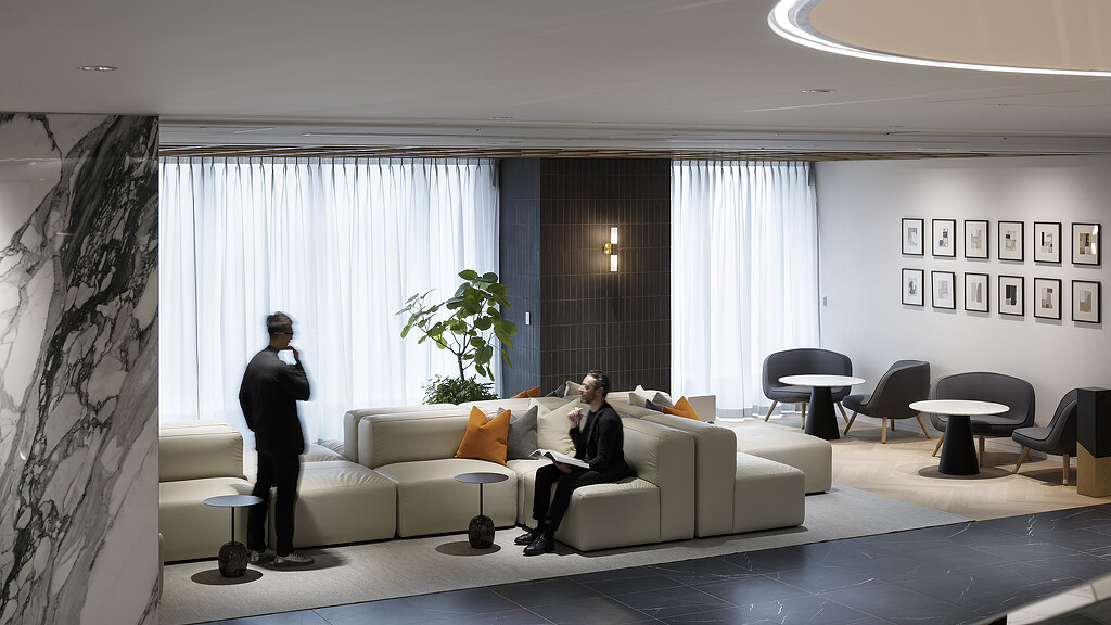 A person sitting on a couch.